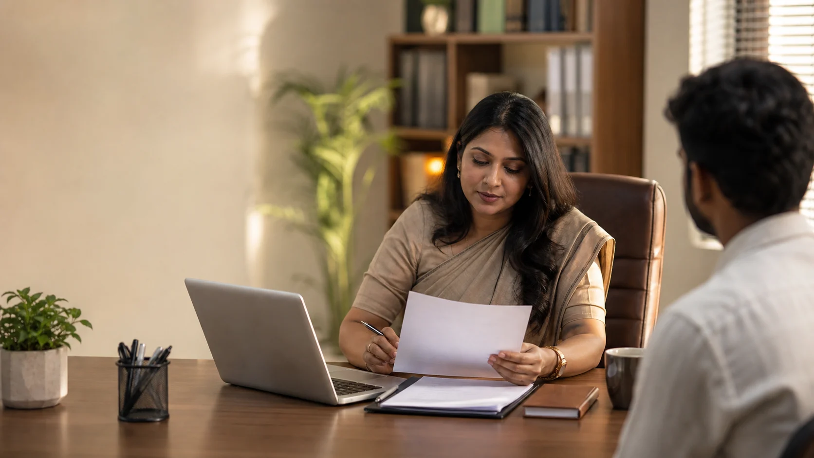 A recruitment adviser reviewing a candidate application